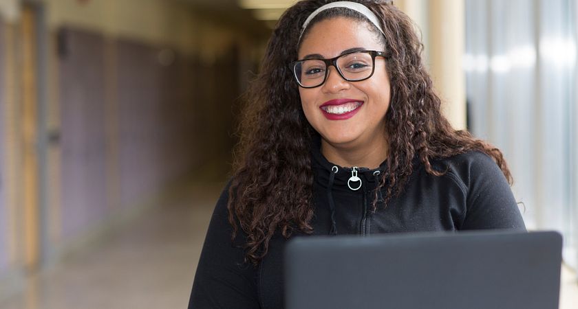 Picture of a Centennial College international student paying for college through wire transfer.